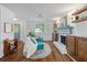 Bright living room with stylish furnishings, featuring a cozy fireplace and elegant decor at 103 Sylvan Ter, Summerville, SC 29485