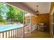 Covered patio features an outdoor grill with a view of the in-ground pool at 1069 Blockade Runner Pkwy, Summerville, SC 29485