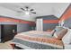 Bedroom featuring two-tone walls, a bed with gray bedding and a black dresser at 1069 Blockade Runner Pkwy, Summerville, SC 29485