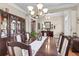 Spacious dining room with hardwood floors, a large table, and elegant decor at 1069 Blockade Runner Pkwy, Summerville, SC 29485