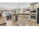 Kitchen and dining area offering an open floorplan, stainless appliances, granite counters at 1069 Blockade Runner Pkwy, Summerville, SC 29485