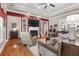 Cozy living room with a fireplace, built-in shelves, and comfortable seating at 1069 Blockade Runner Pkwy, Summerville, SC 29485