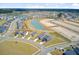 Aerial view of a neighborhood with ponds and new construction at 107 Pescaro Ln, Summerville, SC 29486