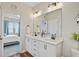 Bright bathroom with double sink vanity, featuring modern fixtures and ample counter space at 107 Pescaro Ln, Summerville, SC 29486
