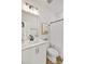 Bright bathroom features a white vanity with sleek black hardware and a shower with a charming penguin art at 107 Pescaro Ln, Summerville, SC 29486