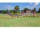 The Cane Bay Plantation community entrance features lush landscaping and attractive signage at 107 Pescaro Ln, Summerville, SC 29486