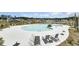 Large community pool with lounge chairs and tables, providing residents a comfortable outdoor space at 107 Pescaro Ln, Summerville, SC 29486