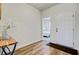 Warm foyer featuring wood flooring, view to bedroom, and natural light at 107 Pescaro Ln, Summerville, SC 29486