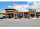 Exterior of the Cane Bay Plantation shopping center featuring various restaurants and retail stores at 107 Pescaro Ln, Summerville, SC 29486