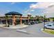 Upscale shopping center with brick facades, covered walkways, palm trees and ample parking near neighborhood at 107 Pescaro Ln, Summerville, SC 29486