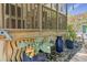 Landscaped patio area with elegant water feature and vibrant potted plants, adding charm and tranquility at 1087 Clearspring Dr, Charleston, SC 29412