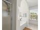 Bright bathroom offers a shower, soaking tub, and natural light from a window at 1087 Clearspring Dr, Charleston, SC 29412