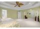 Large bedroom features a tray ceiling, recessed lighting, and decorative archway at 1087 Clearspring Dr, Charleston, SC 29412