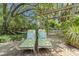 Outdoor deck with mature trees provides shade and a relaxing space with hammocks at 1087 Clearspring Dr, Charleston, SC 29412