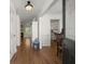 Elegant foyer with hardwood floors, showcasing a view of the living room with a fireplace and the kitchen at 1087 Clearspring Dr, Charleston, SC 29412