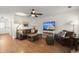 Relaxing living room with hardwood floors, ceiling fan, stylish furniture and decor at 1087 Clearspring Dr, Charleston, SC 29412