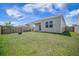 Expansive backyard is fully fenced with a covered patio, beautiful landscaping, and great privacy at 110 Green Passage Ln, Summerville, SC 29486