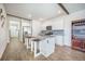 Bright kitchen featuring granite island with seating, stainless steel appliances, and ample cabinet space at 110 Green Passage Ln, Summerville, SC 29486