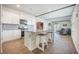 Open concept kitchen featuring granite countertops, stainless steel appliances, and a center island with seating at 110 Green Passage Ln, Summerville, SC 29486
