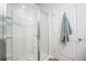 Shower features a sliding glass door and multiple shelves for storage at 110 Green Passage Ln, Summerville, SC 29486