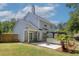 Spacious backyard featuring a patio, pergola, and lush greenery, perfect for entertaining at 110 Mapperton Ct, Summerville, SC 29485