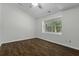 Vaulted bedroom with wood flooring, a window, and ample natural light at 110 Mapperton Ct, Summerville, SC 29485