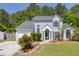 Charming two-story home with manicured lawn and inviting entrance, great curb appeal at 110 Mapperton Ct, Summerville, SC 29485