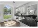 Bright kitchen with stainless steel appliances, granite countertops, and a large window at 110 Mapperton Ct, Summerville, SC 29485