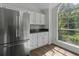 Modern kitchen featuring stainless steel appliances, sleek cabinets, and ample counter space at 110 Mapperton Ct, Summerville, SC 29485