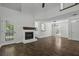 Inviting living room featuring a fireplace, hardwood floors, and ample natural light at 110 Mapperton Ct, Summerville, SC 29485