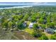 Scenic aerial view of lush waterfront community with beautiful marsh views and mature trees at 112 Berkshire Dr, Wando, SC 29492