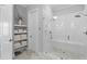 This bathroom boasts a walk-in shower with a pebble floor, offering a spa-like experience at home at 112 Berkshire Dr, Wando, SC 29492