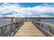 Wide dock with a view of a body of water and greenery at 112 Berkshire Dr, Wando, SC 29492