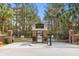 Inviting entrance to St. Thomas Point community with brick pillars and iron gate at 112 Berkshire Dr, Wando, SC 29492