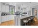 Spacious kitchen featuring a large island, stainless steel appliances, and modern white cabinetry at 112 Berkshire Dr, Wando, SC 29492