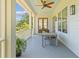 Inviting front porch with outdoor seating and views at 112 Berkshire Dr, Wando, SC 29492