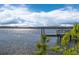 Dock on the water with sunlight reflecting off the surface at 112 Berkshire Dr, Wando, SC 29492
