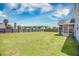 Spacious fenced-in backyard, offering privacy and ample space for outdoor activities at 1130 Moss Grove Dr, Moncks Corner, SC 29461