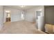 Upstairs hallway with carpet floor and doors that leads to bathroom and bedrooms at 1130 Moss Grove Dr, Moncks Corner, SC 29461