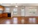 Bright kitchen with wooden cabinets, hardwood floors, modern appliances, and natural light creating a cozy culinary space for everyday cooking at 1130 Moss Grove Dr, Moncks Corner, SC 29461