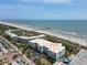 Beachside condominium complex with parking, nearby boardwalk, and ocean views at 1140 Ocean Blvd # 201, Isle of Palms, SC 29451