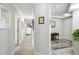 Bright hallway with wood floors showcases tasteful decor and multiple access points at 1140 Ocean Blvd # 201, Isle of Palms, SC 29451