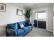 This is a comfortable seating area next to the bedroom that has access to a balcony with ocean views at 1140 Ocean Blvd # 201, Isle of Palms, SC 29451