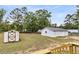 Spacious backyard with detached garage and storage shed at 119 Silver King Ave, Cross, SC 29436
