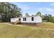 Charming single-story home with well-maintained exterior and spacious yard at 119 Silver King Ave, Cross, SC 29436