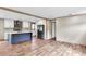 Open concept kitchen with modern island, stainless steel appliances and hardwood floors at 119 Silver King Ave, Cross, SC 29436