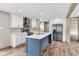 Spacious kitchen featuring an island, stainless steel appliances, and light cabinets at 119 Silver King Ave, Cross, SC 29436