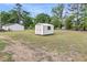 View of storage shed in expansive backyard at 119 Silver King Ave, Cross, SC 29436
