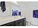 Bathroom with a clean white countertop, dark wood cabinetry and a shower with patterned curtain at 121 Keaton Brook Dr, Summerville, SC 29485