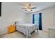 Bright bedroom with a ceiling fan, window with blinds, and a comfortable-looking bed at 121 Keaton Brook Dr, Summerville, SC 29485